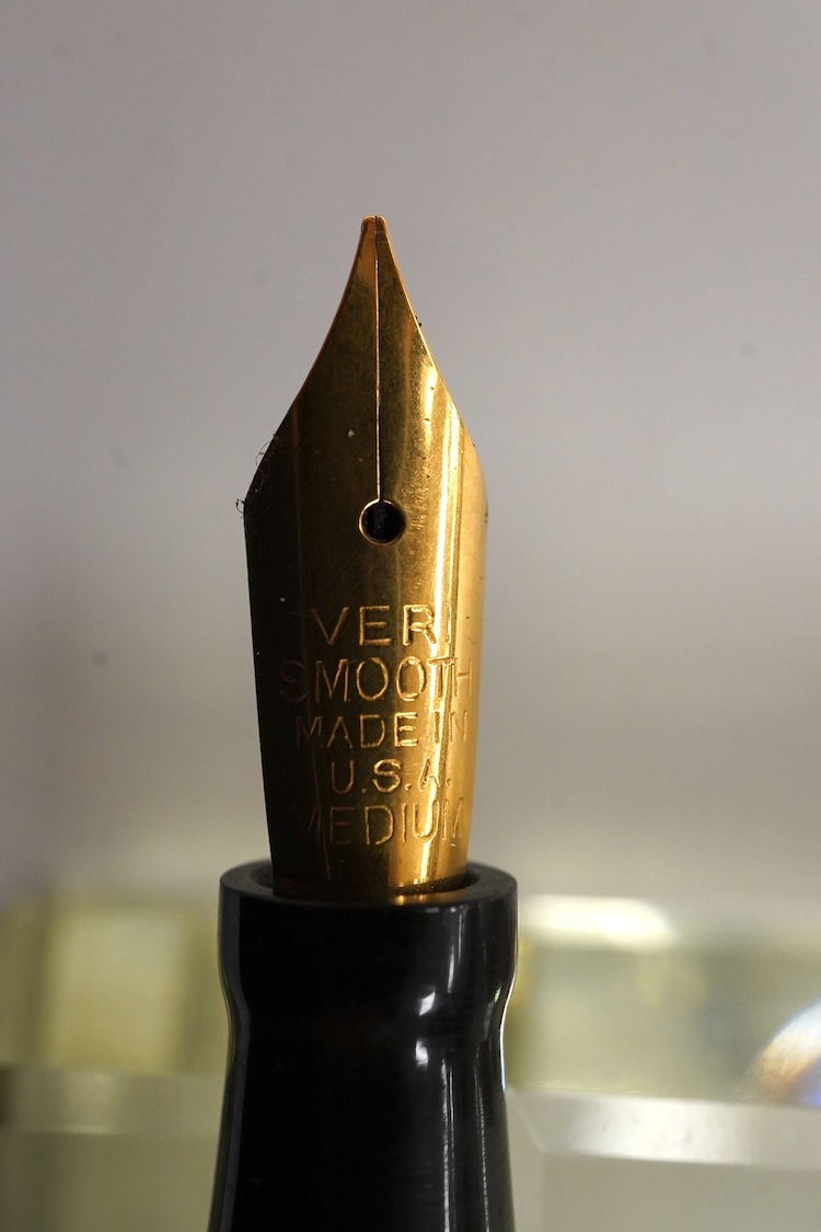 A rare Conklin desk base with 'barrel' tulip, with lapis blue Conklin Endura desk pen